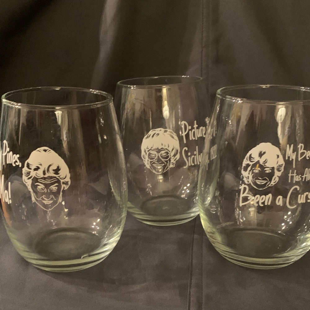 Golden Girls stemless wine glasses with quotes from the TV show,. 4.5 in. tall.